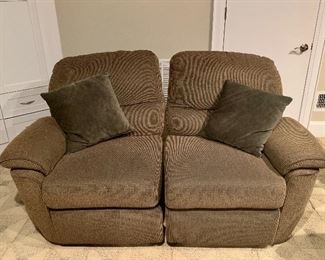 Item 83:  (2) Recliners - 69"l x 24"w x 33.5"h - each one is a set of two:  $200 each  
