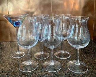 Item 213:  Lot of glasses, art glass Martini and 5 seeded pina colada glasses: $18