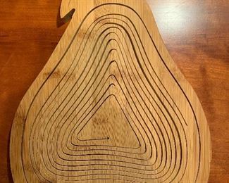 Item 236:  Cut wood pear trivet/basket - 13.5" x 10": $22