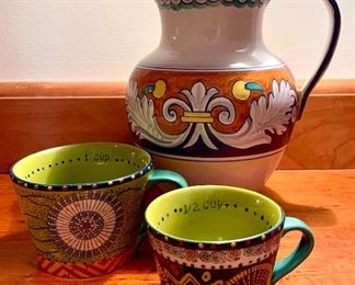 Item 257:  Set of three, hand painted - two measure cups and pitcher:  $24