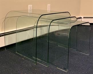 Item 178:  SICA for Roche Bobois molded glass waterfall nesting tables:                                                                                   Largest - 24"l x 19.75"w x 17.5"h: $425