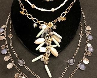 Item 116:  (3) Necklaces with one with purple beads:  $55