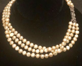 Item 117:  Vintage three row hand knotted pearl necklace with sterling silver clasp: $85