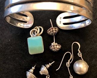 Item 122:  (3) Pairs of sterling silver earrings, turquoise charm, and bracelet:  $115