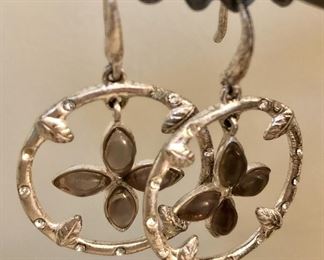 Item 125:  Earrings with flower center (not marked): $12