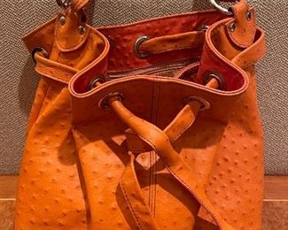 Item 320:  Orange Cecloni Piero Bag: $40