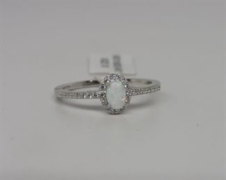 Stone: White Opal & Topaz
Type: Ring
Metal: Sterling Silver
Size: 10
Located in: Chattanooga, TN **Sold As-Is Where Is**
*Gemstones Believed to Be Lab Created*