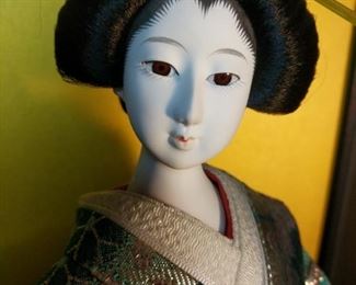 collectible Asian doll in shadow box