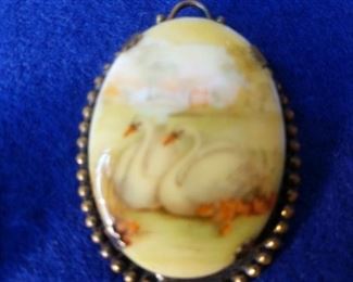 two pendants and one pair of earrings
