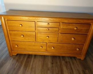 wooden 9 drawer dresser 19 in by 63 in by 33 inches high
