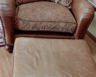 Large leather and fabric chair with ottoman