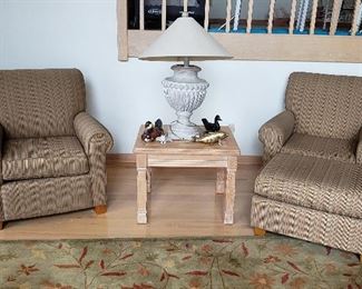 Gold striped upholstered chairs, one ottoman, pickled end table, duck accessories