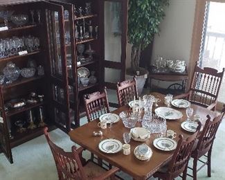 Large china cabinet, dining table with leaves, six dining room chairs with needlepoint seats, 2 arm/4 side, Spode Christmas china, Ficus tree (2)