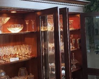 Large lighted china cabinet; Waterford Lismore crystal,  Gorham crystal stems, elegant glass