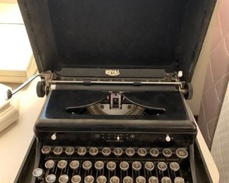 #64	Royal Typewriter w/round Glass Keys	 $50.00 
