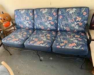 #81	Vintage Black Iron Sofa w/square Blue floral cushions  67" Long	 $150.00 
