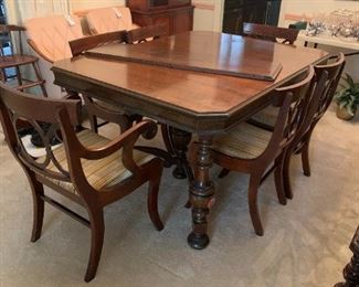 #194	Table	Tell of 2 city 4 ball legs  Dining table with 6 chairs Mahogany w 1 leaf 5-6 ft x 42x30	 $275.00 
