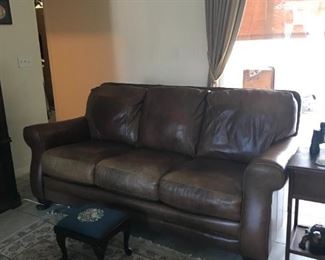 Caramel brown colored genuine leather sofa in perfect condition. Measures 80" x 35" x 36".  *Color is most accurate as pictured in the matching loveseat photo* $1200 for the pair
