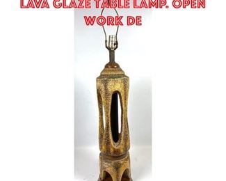 Lot 2041 Mid Century Modern Lava Glaze Table lamp. Open work de
