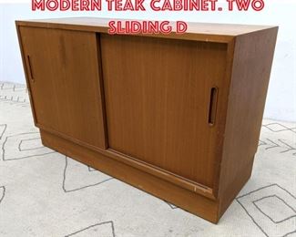 Lot 2176 POUL HUNDEVAD Danish Modern Teak Cabinet. Two Sliding D