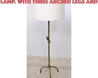 Lot 2229 Decorator Brass Floor Lamp. with three arched legs and