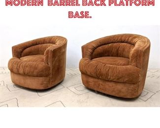 Lot 2342 Pair Mid Century Modern Barrel Back platform base.