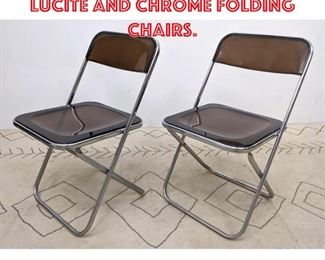 Lot 2354 Pair Italian Smoked Lucite and Chrome Folding Chairs.