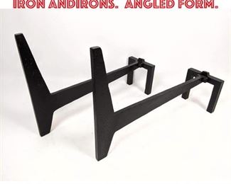 Lot 2355 Modernist French Style Iron Andirons. Angled form.