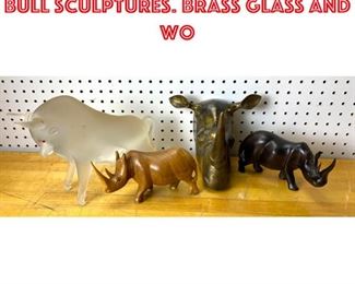 Lot 2556 4pcs Rhinoceros and Bull Sculptures. Brass glass and wo