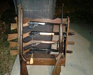 Gun rack with vintage BB rifles