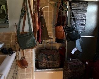 Nice leather purses and nearly new luggage