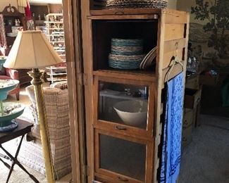 Antique pull up glass shelf storage cabinet