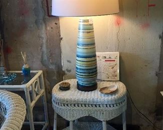 Wicker with one of a pair of vintage lamps