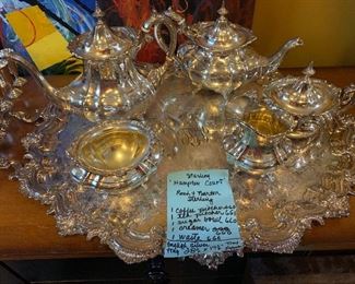 Sterling 'Hampton Court' Reed and Barton (1) Coffee pitcher 660, (1) tea pitcher 661, (1) sugar bowl 660, (1) creamer 660 and (1) waste 660.. Silver plate monogram tray 28" x19.5"      82 TROY OZ $2,200