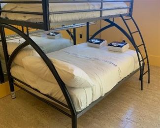 Black metal frame bunk bed- $250 New mattresses used lightly since April 2019, lower double quality mattress with twin foam mattress on top