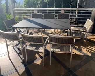 Outdoor patio glass top table opaque- extends to accommodate 10 with chairs- some corrosion on frame. Great condition- $399 
