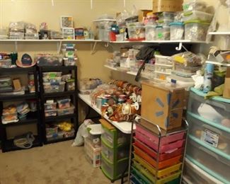 Craft room full of ribbon, beads, costume jewelry, buttons, notions, yarn, trim, fabric, and so much more.