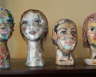 Handmade mannequin heads by Suzanne "Eden" Murphy.
