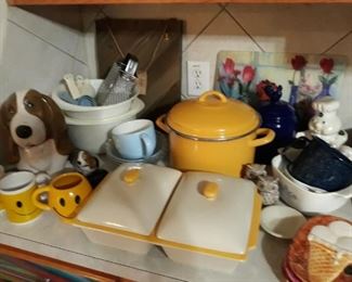 Pillsbury Doughboy cookie jar, salt shaker, and utensil holder along with other nice kitchen items.