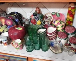 Apple and fruit themed kitchen items.