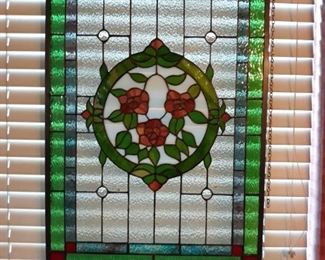 Set of two stained glass window panels.