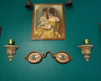 Wall art, shelves, and an original oil painting by Suzanne "Eden" Murphy.