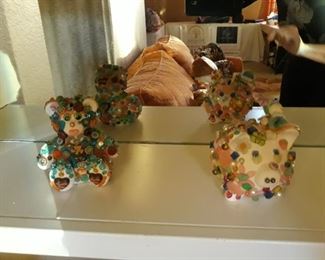 Handmade jeweled piggy banks.