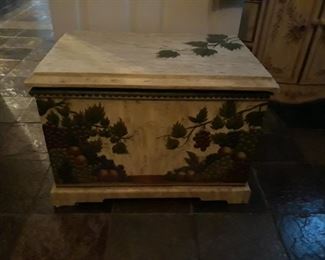 Painted storage box with ivy motif.