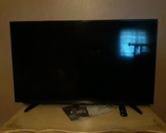 Sharp/Roku TV that is about 38".
