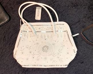 Women's Purses & Handbags (a sampling of available items is shown here)