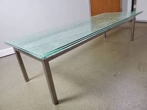 Awesome Cracked/Crackled Glass Coffee Table with metal base.  This item is not broke as it was made that way!  24" W x 66" L x 16" H. This table came from a very high-end home in St. Louis Park. 