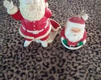 Santa figures, one candle