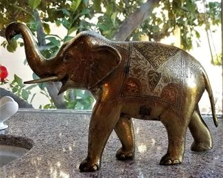 Brass elephant. Did you know when the elephant's trunk is up that means good luck?