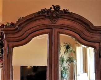 Top view...Simply gorgeous French mirrored chifferobe sometimes called an armoire. Can be used as extra storage as the owner did for extra kitchen and dining items or for a bookcase or clothes, etc.